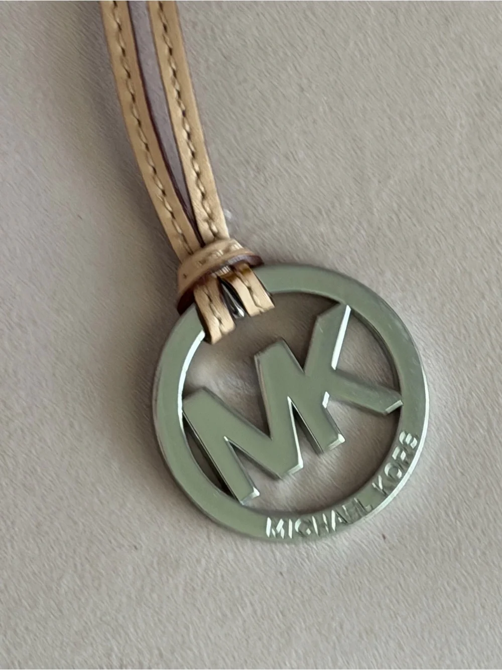 Michael Kors Tan Leather Strap with Silver MK Logo Charm